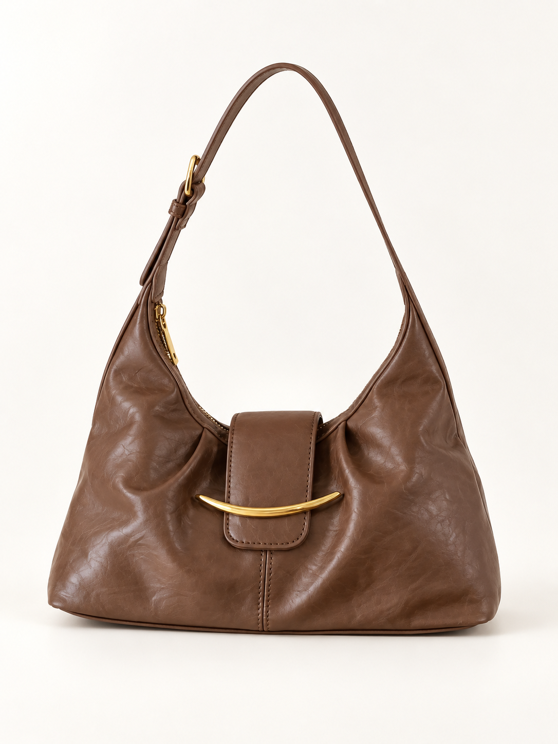 Maven Buckle Crossbody Bag in Brown — studio view showing material and hardware.