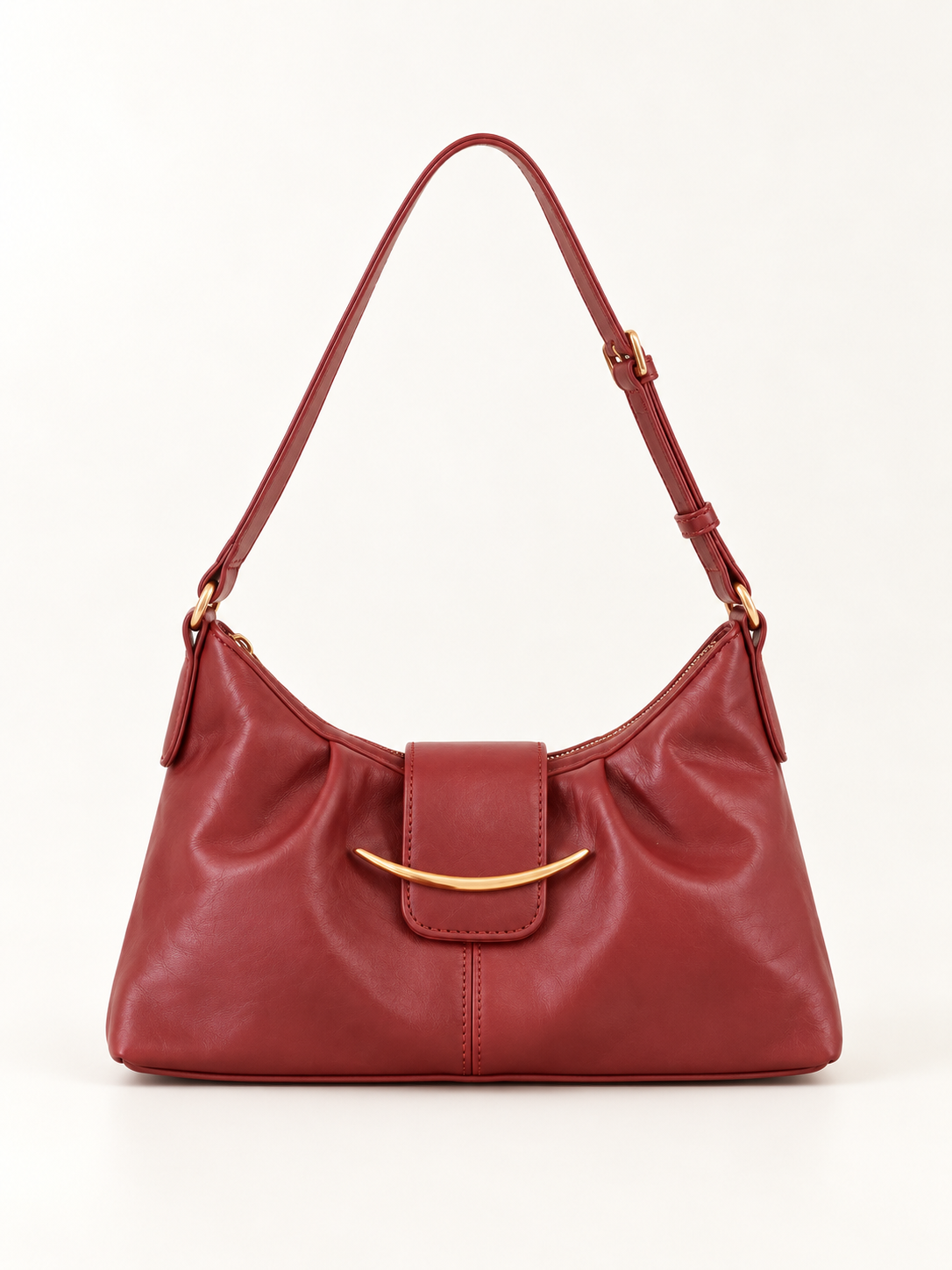 Maven Buckle Crossbody Bag in Red — studio view showing material and hardware.