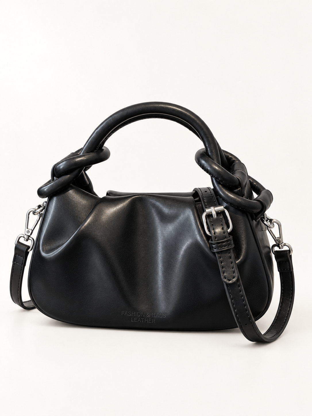 Maven Knot Handle Crossbody in Black — studio view showing material and hardware.