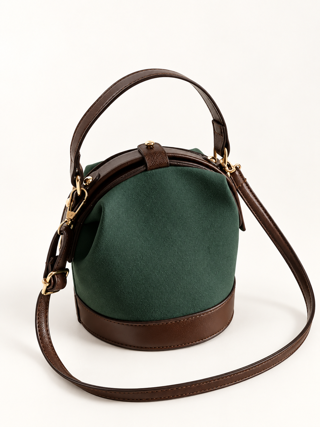 Maven Mini Two-Tone Bucket Bag in Green — studio view showing material and hardware.