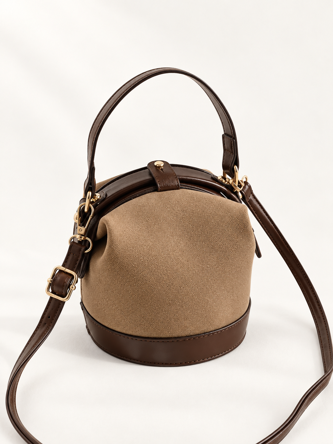 Maven Mini Two-Tone Bucket Bag in Khaki — studio view showing material and hardware.