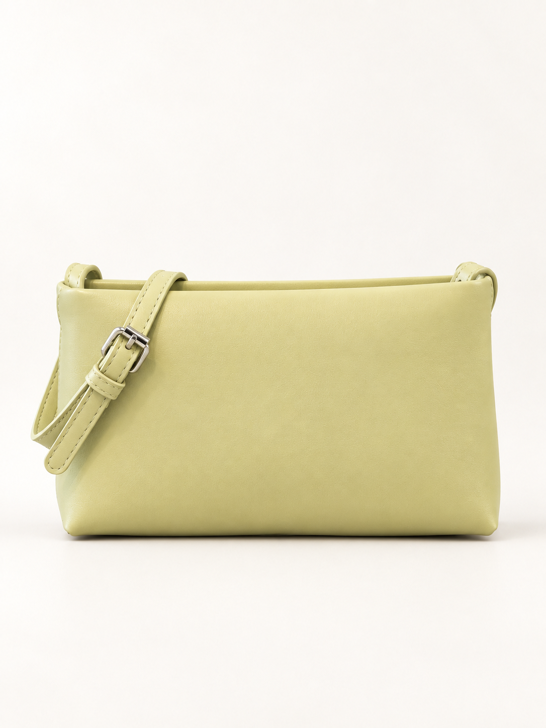 Maven Structured Mini Crossbody in Green — studio view showing material and hardware.