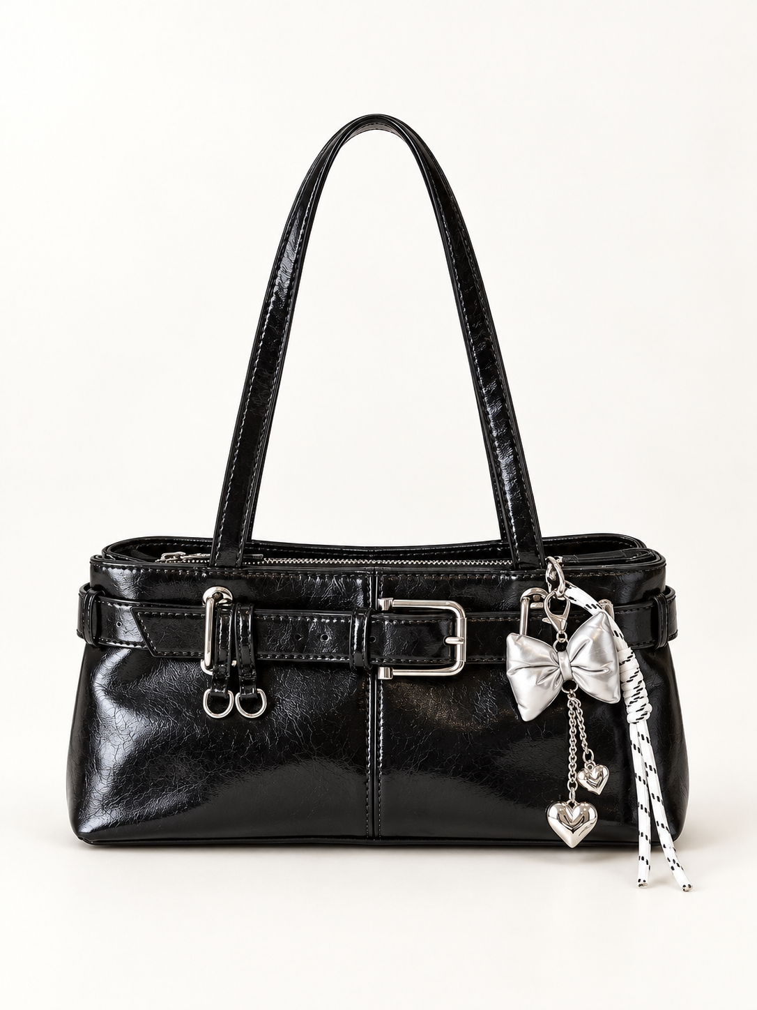 Maven Structured Shoulder Bag in Black — studio view showing material and hardware.
