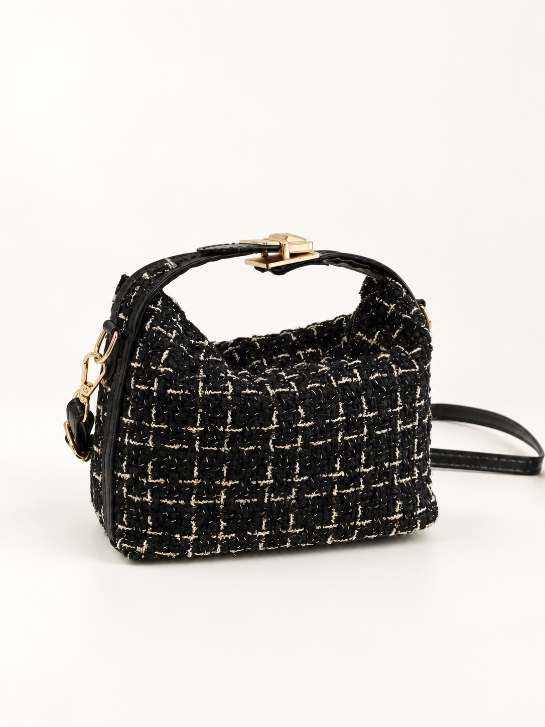 Maven Woven Shoulder Bag in Black — studio view showing material and hardware.